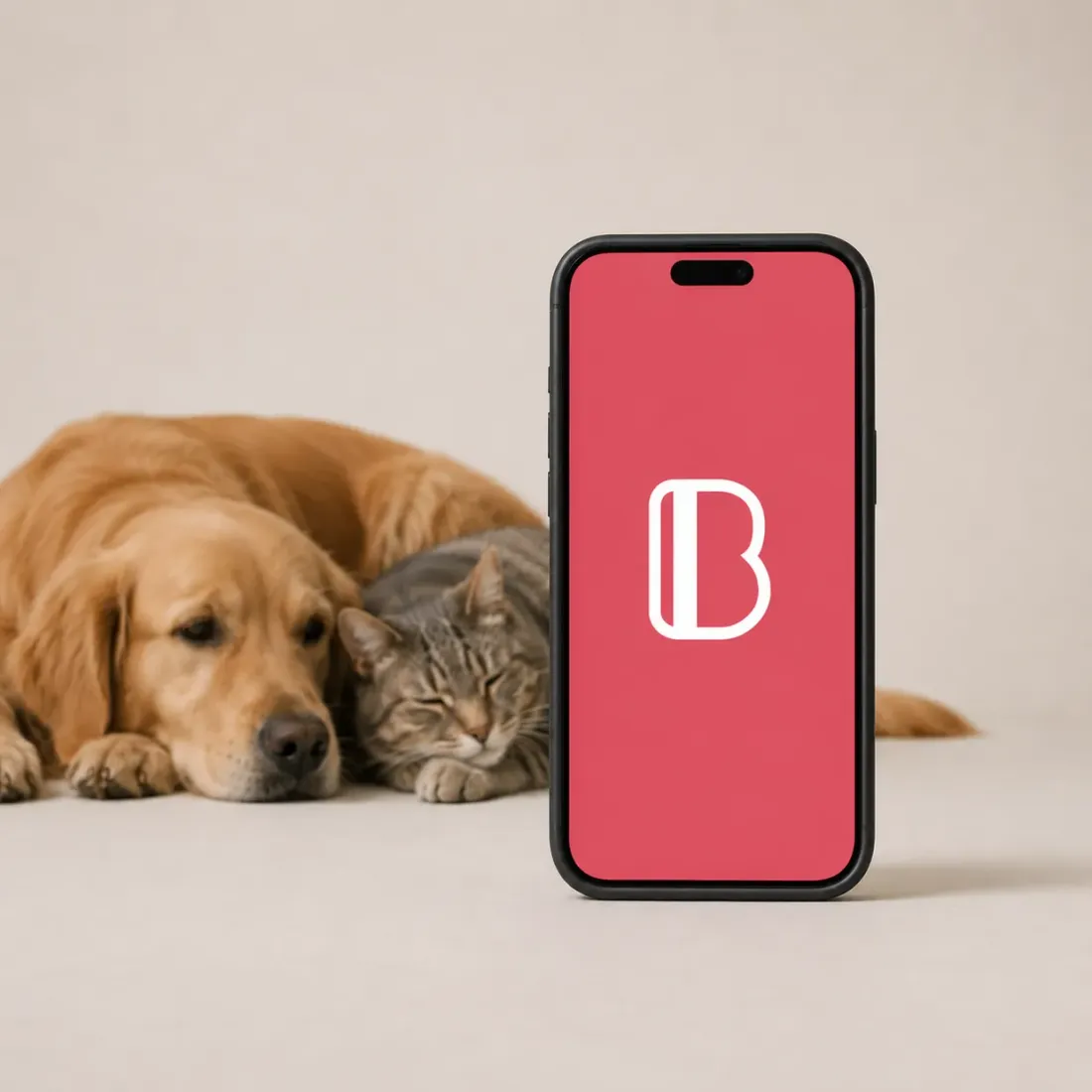 En hund och en katt bredvid en telefon med Bonuscard